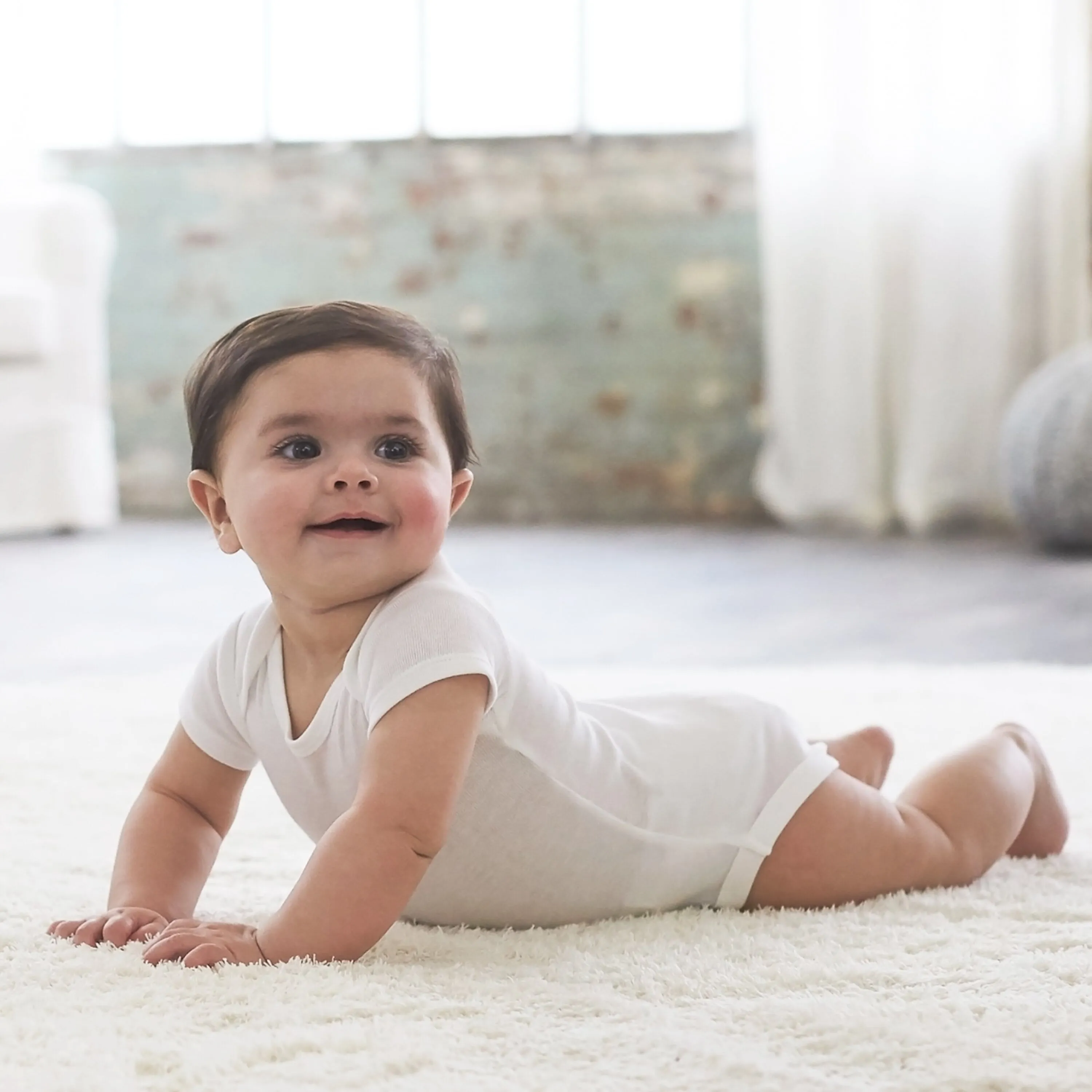 4-Pack Baby Neutral White Onesies® Bodysuits