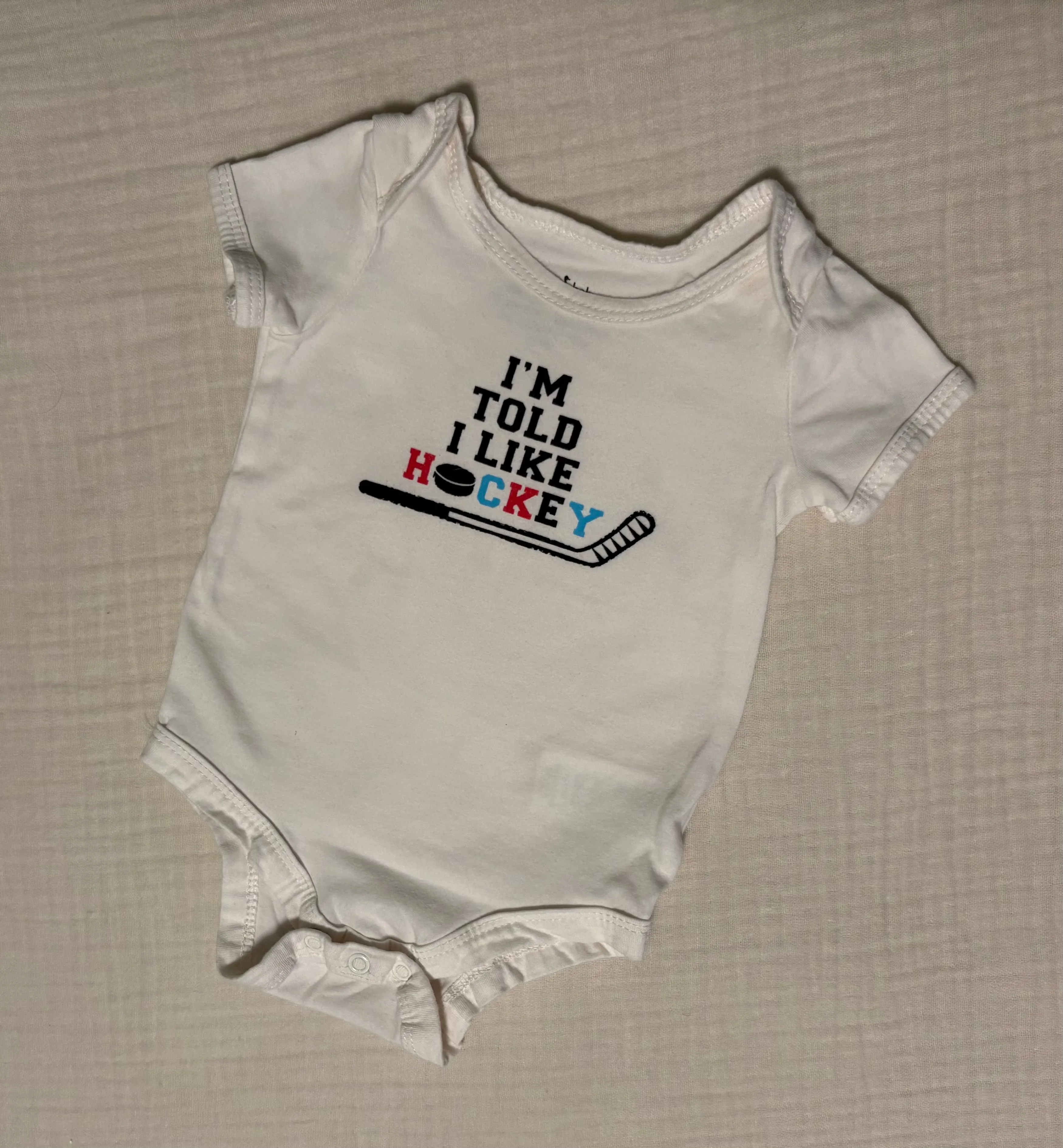 "I'm Told I Like Hockey" 3-6 Months Unisex Short Sleeved Onesie , Kids 6 Month (3-6M)
