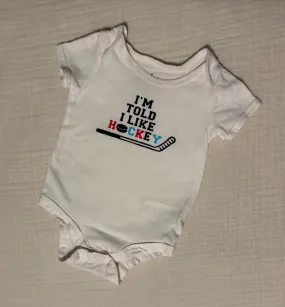 "I'm Told I Like Hockey" 3-6 Months Unisex Short Sleeved Onesie , Kids 6 Month (3-6M)